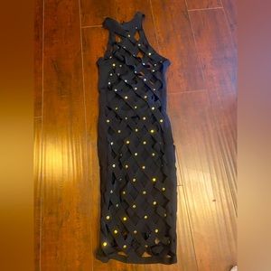 Bebe black band dress. Super sexy yet classy. Love it but have to many dresses.